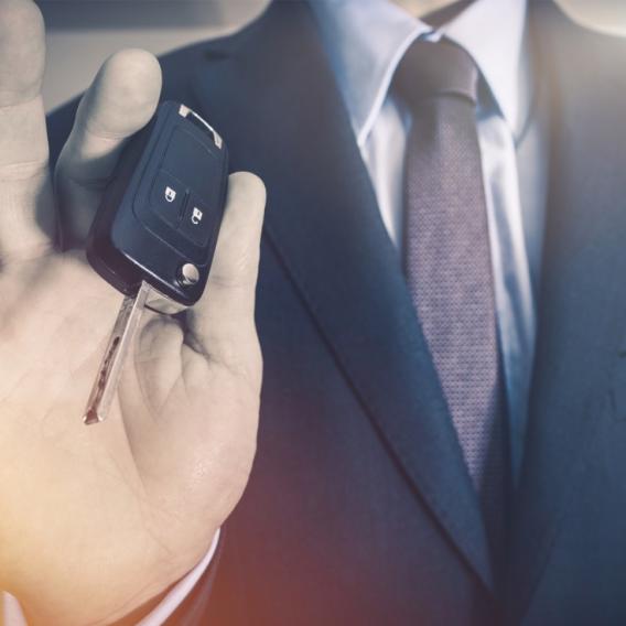 salesman with car keys