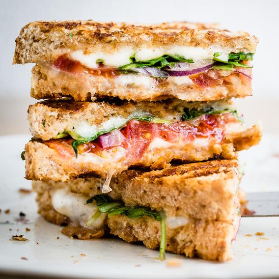 A stacked of sandwiches on a plate