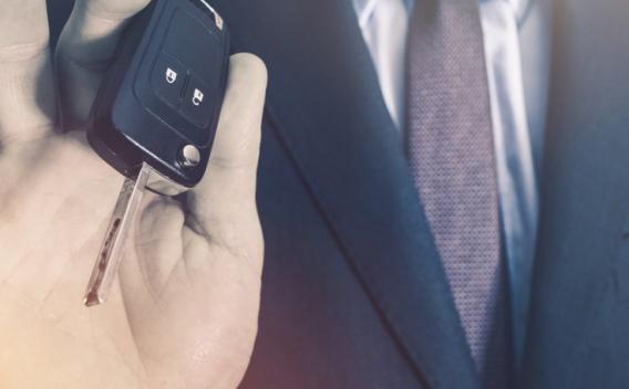 salesman with car keys