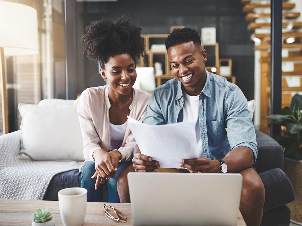 Couple reviewing paperwork together