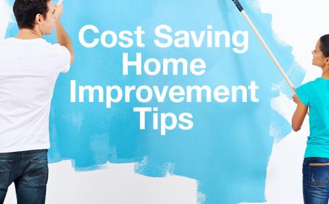 Two people painting a white wall blue, with this text displayed: Cost Saving Home Improvement Tips