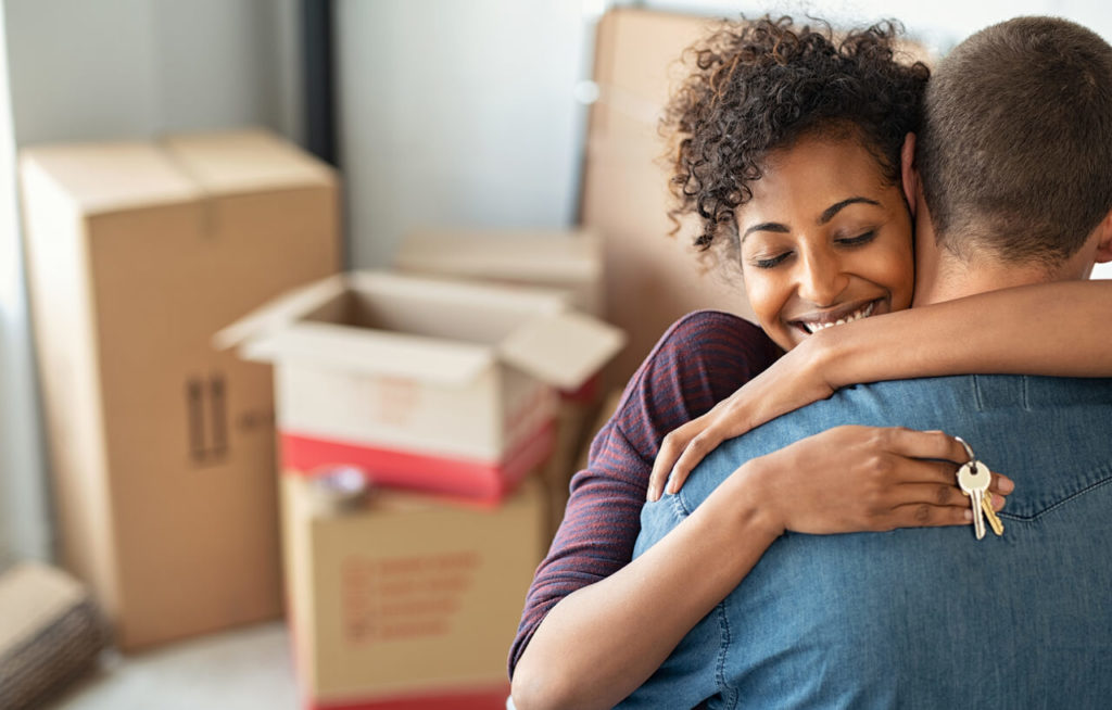 Couple moving into their new home