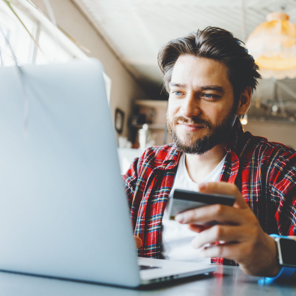 a man uses a credit card vs. line of credit to make a purchase