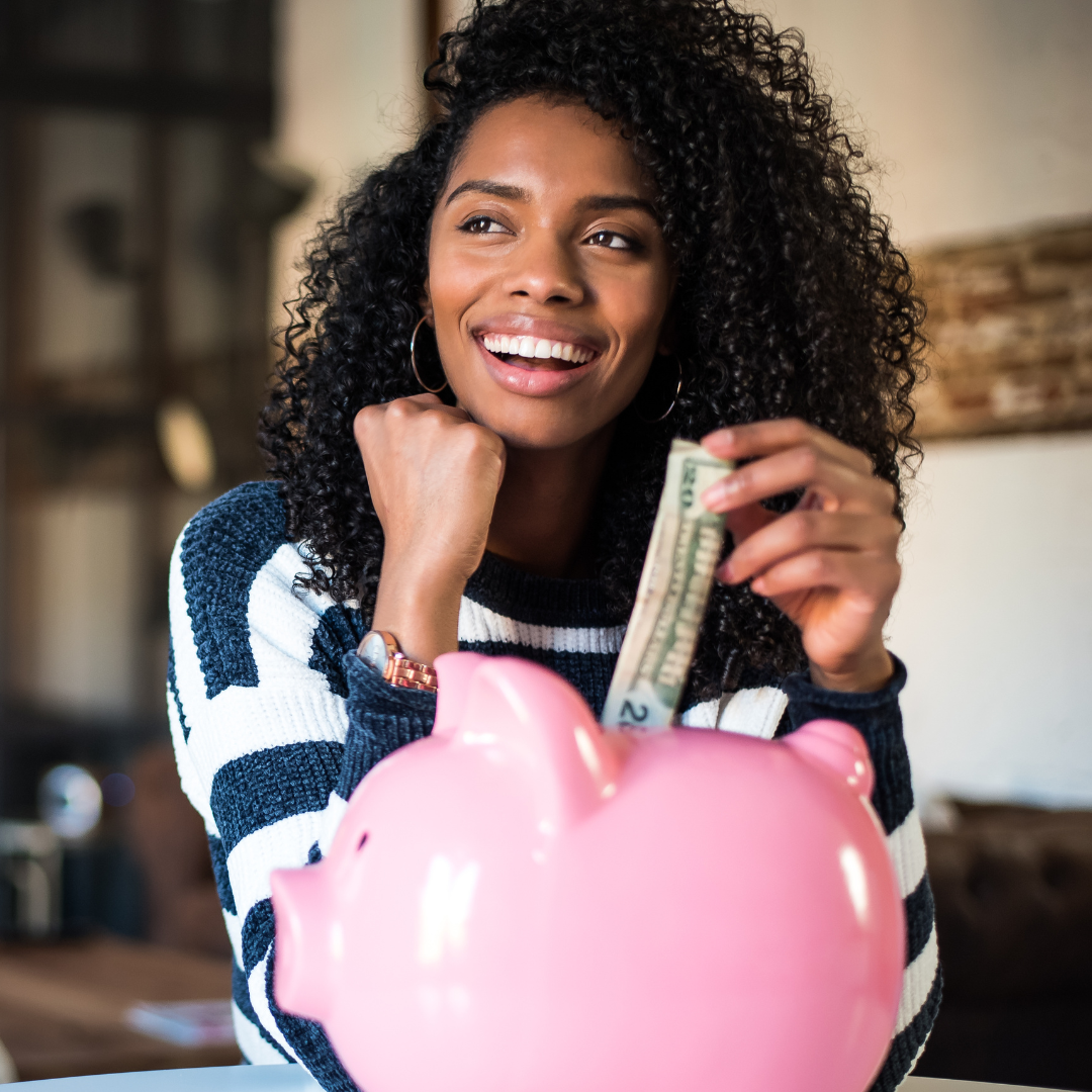 Black Woman Saving in Piggy Bank